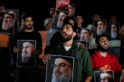 Communists protest Nasrallah murder by Israel